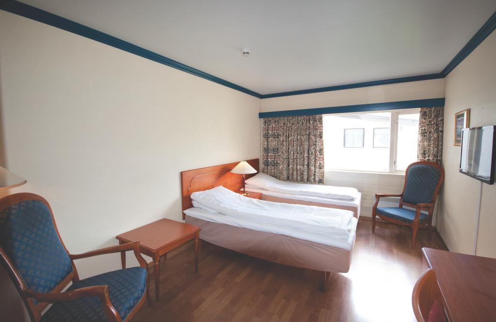 Pers Hotel Каґолоґоло Номер фото